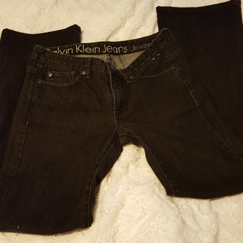 Vintage Calvin Klein bell bottom jeans. Black, size 6.